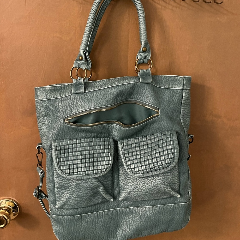 Maurice’s blue purse
